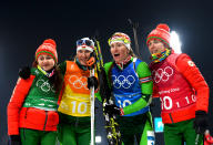 <p>Belarus’s Iryna Kryuko, Dzinara Alimbekava, Darya Domracheva and Nadezhda Skardino celebrate winning gold after the Women’s 4x6km Relay on day 13 of the PyeongChang 2018 Winter Olympic Games, February 22, 2018.<br> (Photo by Quinn Rooney/Getty Images) </p>