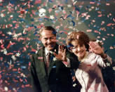 FILE - Bob Dole and his wife Elizabeth wave from the podium on the floor of the Republican National Convention in San Diego, Aug. 15, 1996, as confetti falls after Dole accepted the Republican presidential nomination. Bob Dole, who overcame disabling war wounds to become a sharp-tongued Senate leader from Kansas, a Republican presidential candidate and then a symbol and celebrant of his dwindling generation of World War II veterans, has died. He was 98. His wife, Elizabeth Dole, posted the announcement Sunday on Twitter (AP Photo/J. Scott Applewhite, File)