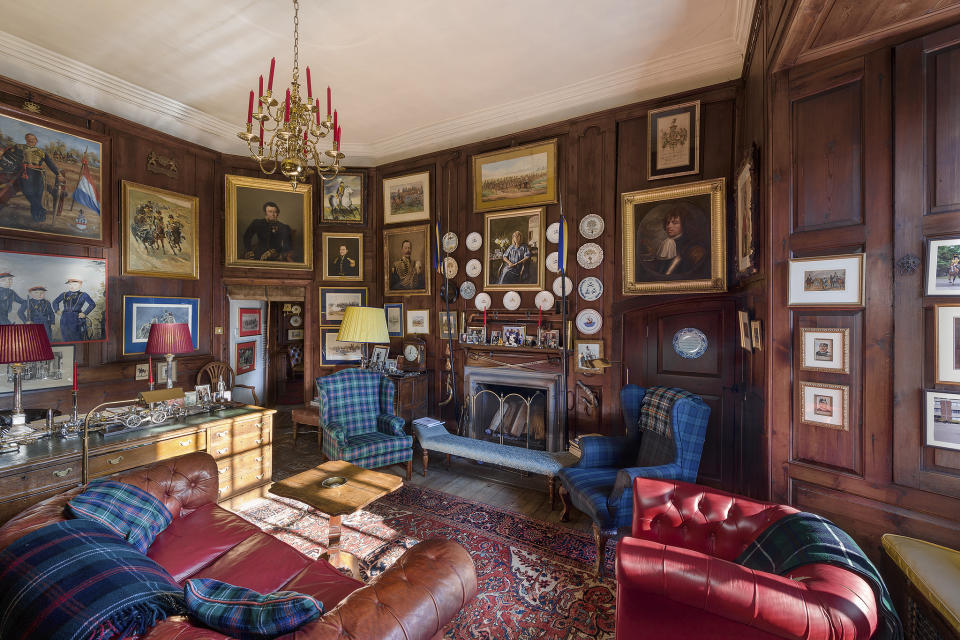 This plush wood-panelled room could be yours - yes please (Image: Savills) 