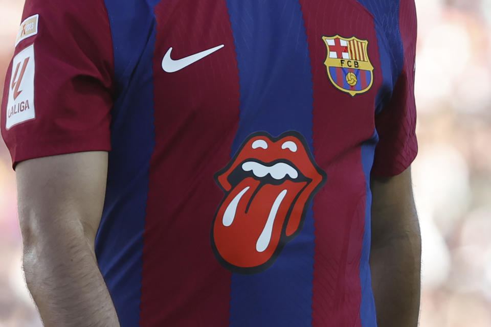 A logo of the English rock band Rolling Stones seen on the Barcelona's Ilkay Gundogan's shirt during the La Liga soccer match between Barcelona and Real Madrid at the Olympic Stadium in Barcelona, Spain, Saturday, Oct. 28, 2023. (AP Photo/Joan Monfort)
