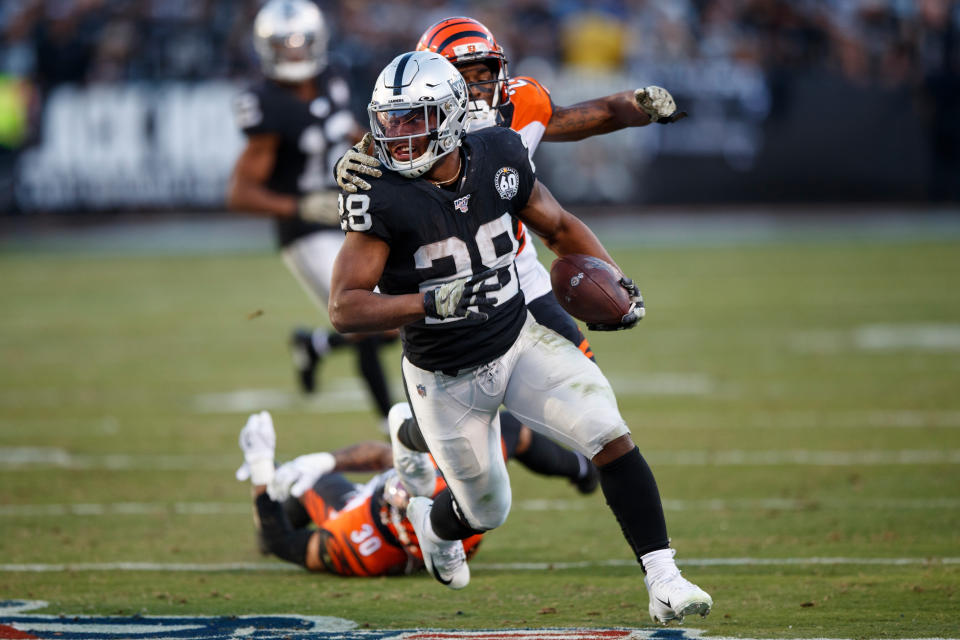 OAKLAND, CA - NOVEMBER 17: Running back Josh Jacobs #28 of the Oakland Raiders rushes up field against the Cincinnati Bengals during the fourth quarter at RingCentral Coliseum on November 17, 2019 in Oakland, California. The Oakland Raiders defeated the Cincinnati Bengals 17-10. (Photo by Jason O. Watson/Getty Images)