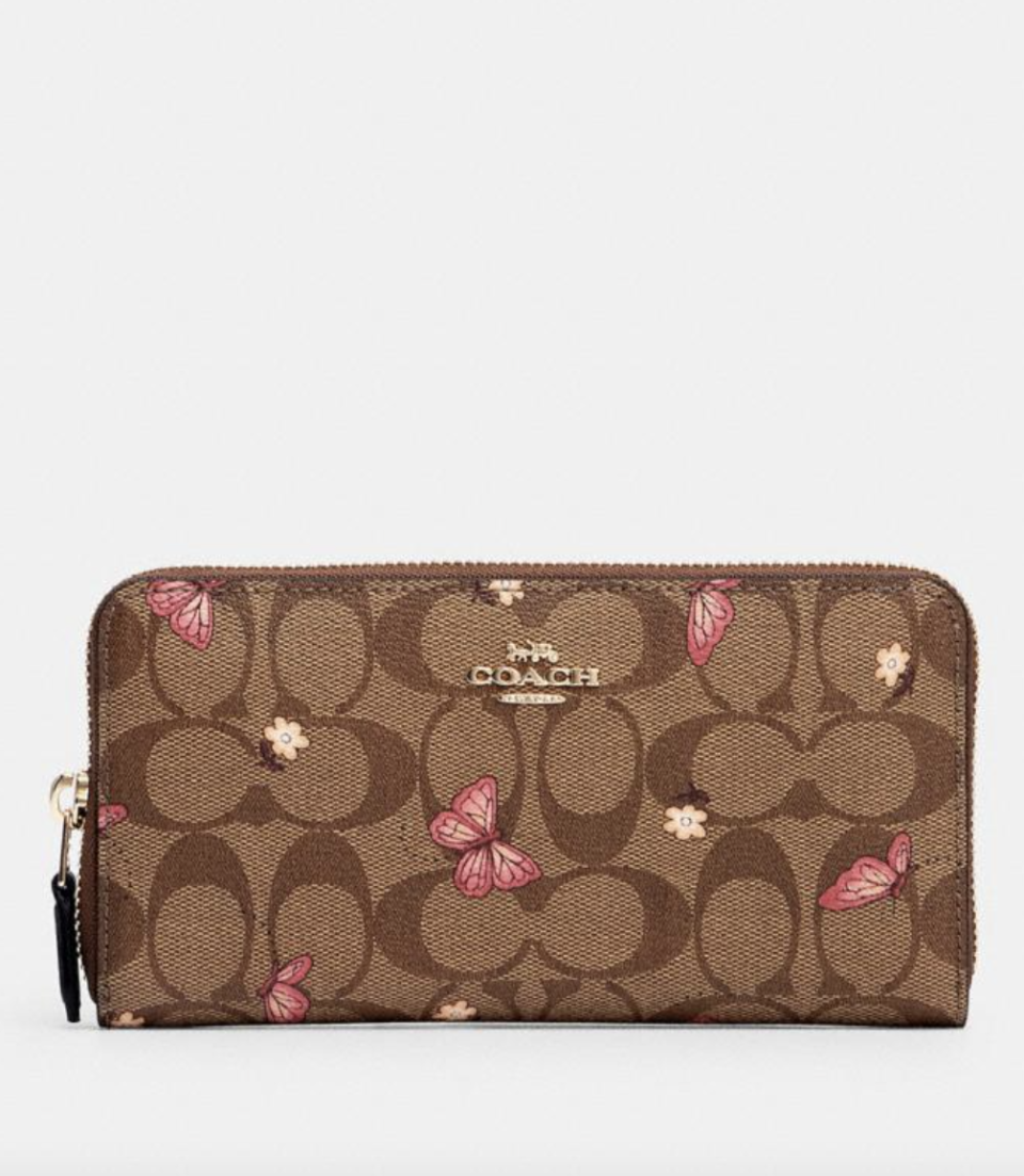 Accordion Zip Wallet in Signature Canvas with Butterfly Print (Photo via Coach Outlet)