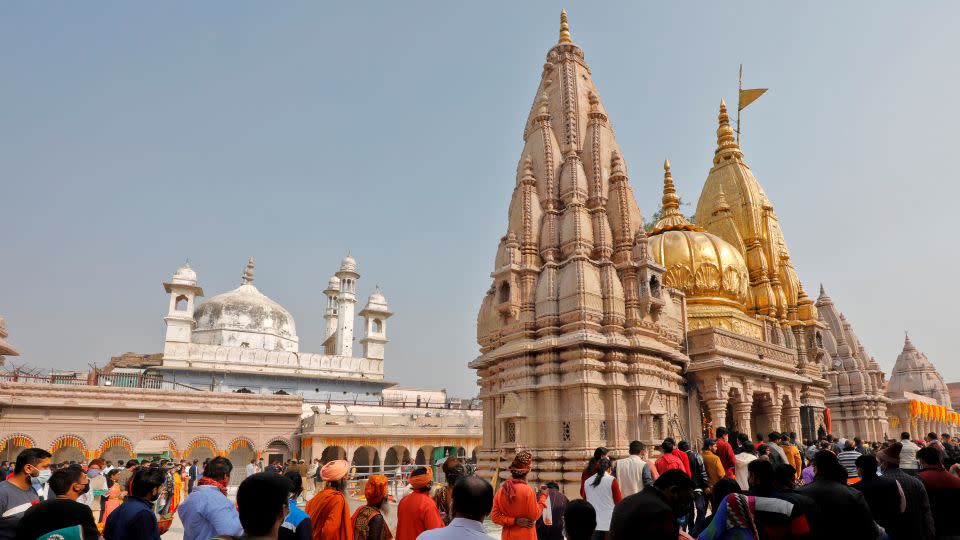 The Kashi Vishwanath Temple stands next to the Gyanvapi Mosque in Varanasi. Pictured here in December 12, 2021. - Pawan Kumar/Reuters