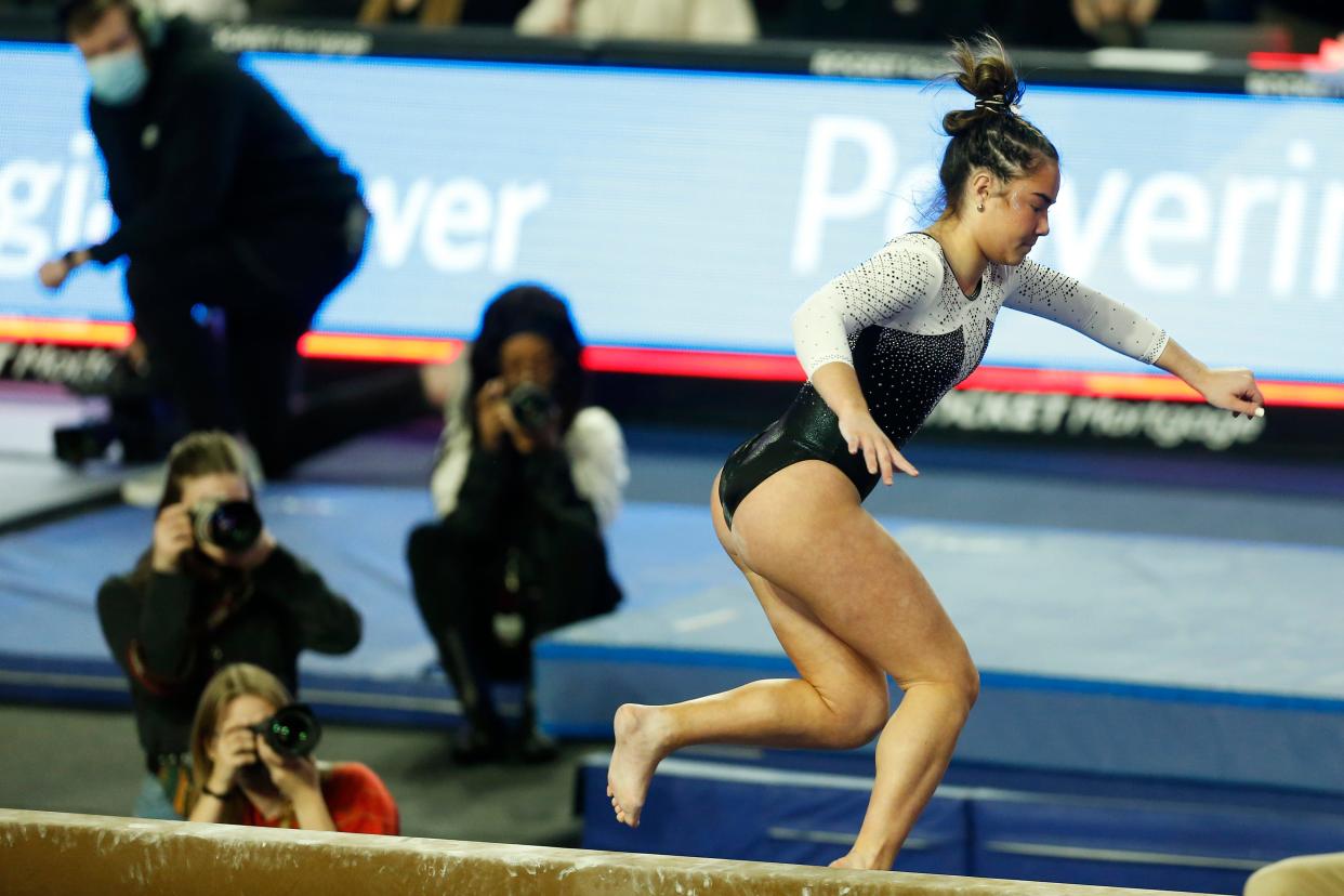 Georgia's Abbey Ward falls while competing on the beam  during an NCAA gymnastics meet between Florida and Georgia in Athens, Ga., on Friday, Jan. 21, 2022. Florida won 196.975-194.475