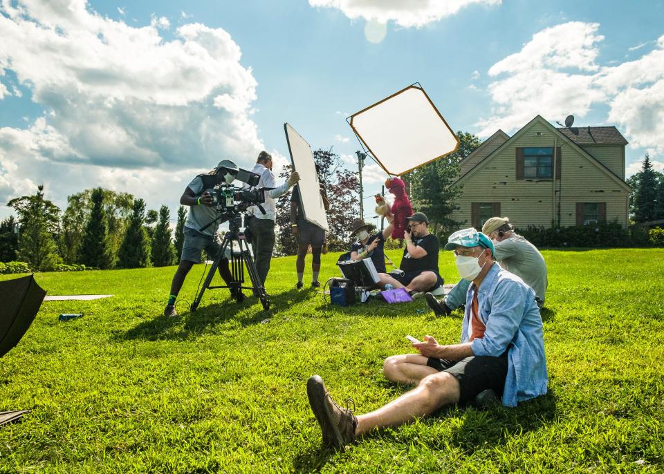 Ben Lehman (foreground) with puppeteers Carmen Osbahr and Ryan Dillon. "Sesame Street" filmed scenes for its upcoming season at Harvest Moon Farm & Orchards in North Salem.