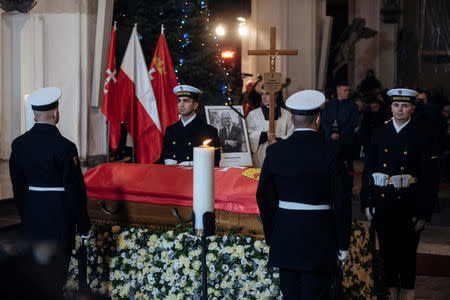 The coffin of Pawel Adamowicz, Gdansk mayor who died after being stabbed at a charity event, is seen at St. Mary's Basilica in Gdansk, Poland January 18, 2019. Agencja Gazeta/Bartosz Banka via REUTERS