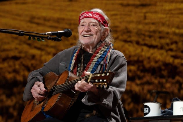 Willie Nelson and his wife Annie are releasing a cookbook of cannabis recipes. - Credit: Suzanne Cordeiro/AFP/Getty Images