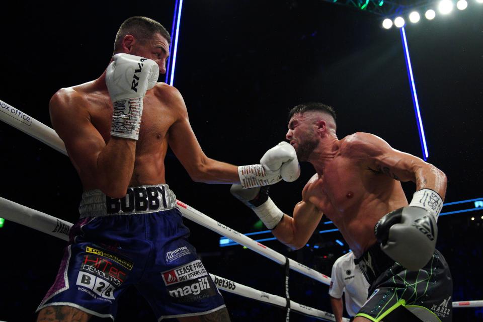 Josh Cullen lands a left hook, the shot that eventually floored Mark Heffron (PA)