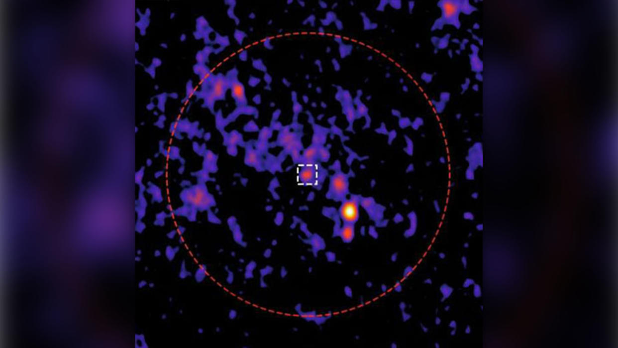  The team identified a new radio source (white square) in the center of an ancient globular cluster (red circle). 