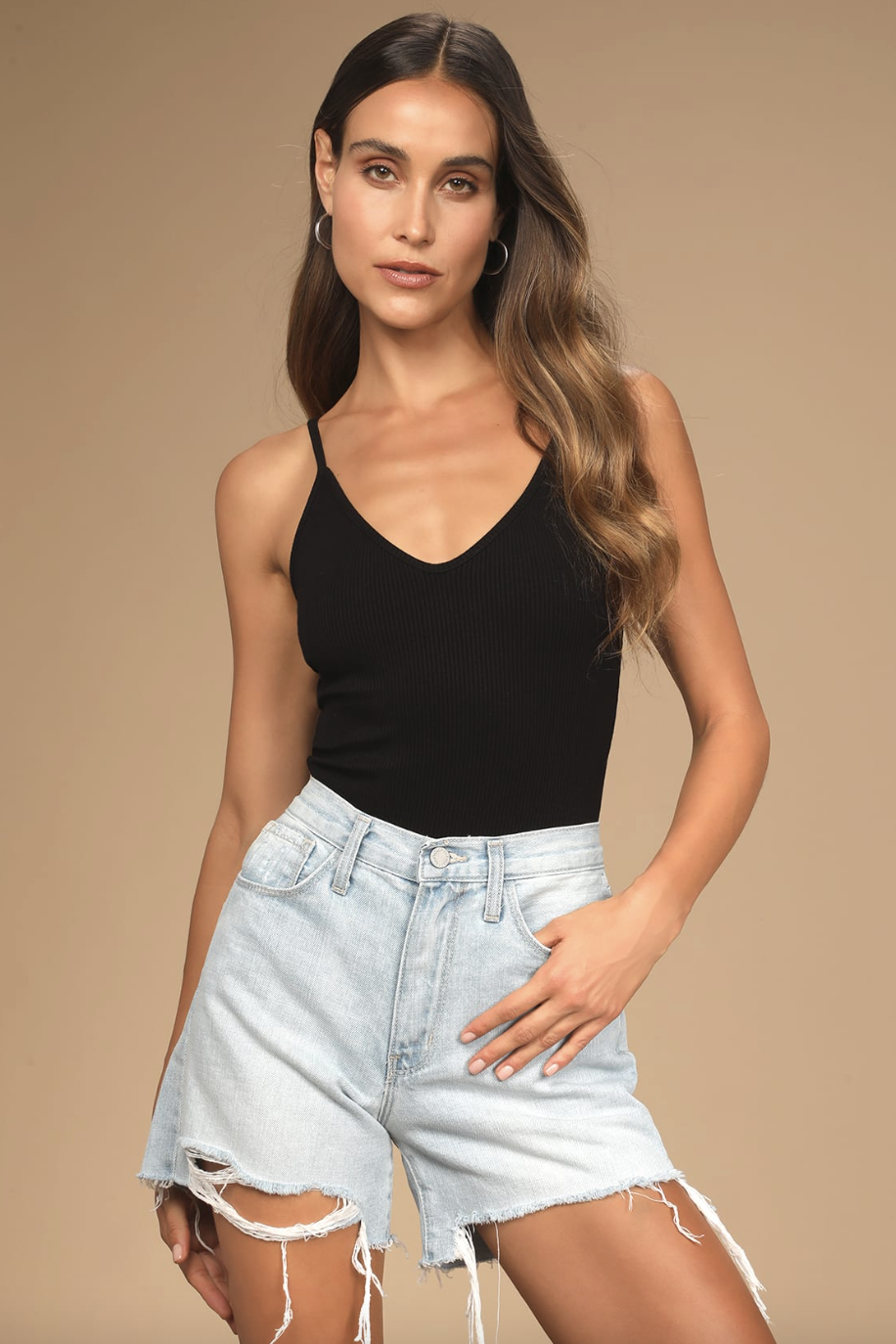 model in black tank top and denim shorts, Just Black Bring Your A-Game Light Wash High-Rise Distressed Shorts(Photo via Lulus)