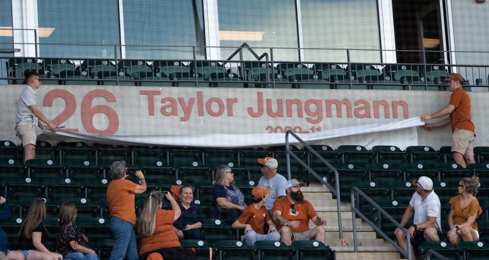Taylor Jungmann's No. 26 is unveiled at UFCU Disch-Falk Field during his jersey retirement ceremony Saturday.