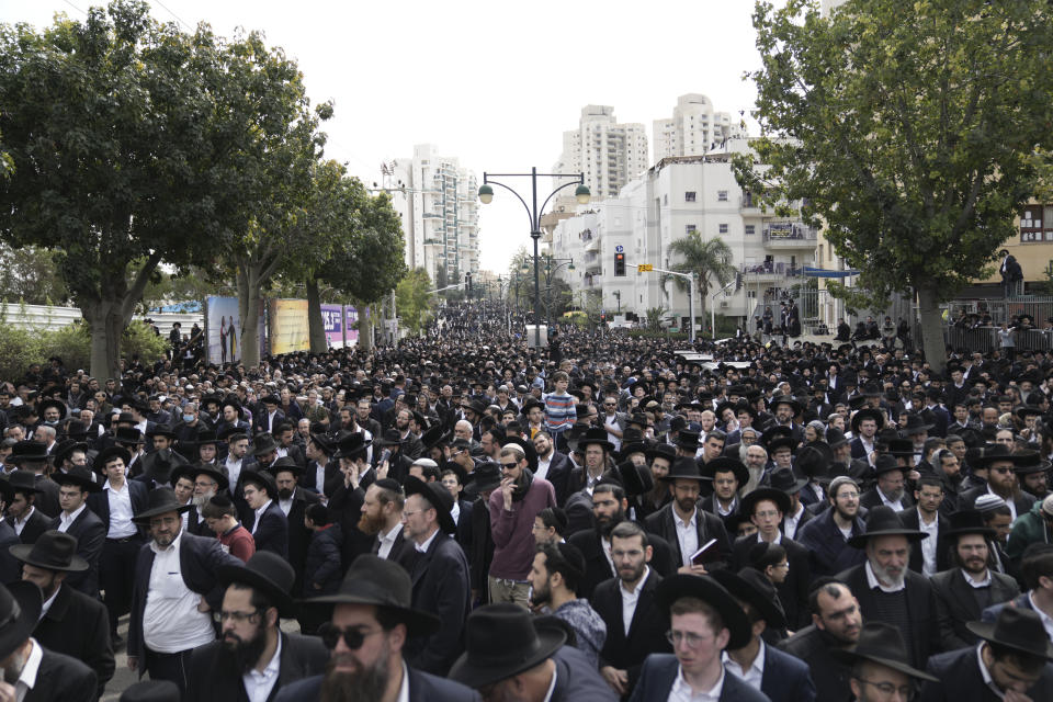 Ultra-Orthodox Jews attend the funeral of Rabbi Chaim Kanievsky in Bnei Brak, Israel Sunday, March 20, 2022. Kanievsky was one of the most influential scholars in the religious community in Israel. He died Friday at the age of 94. (AP Photo/Oded Balilty)