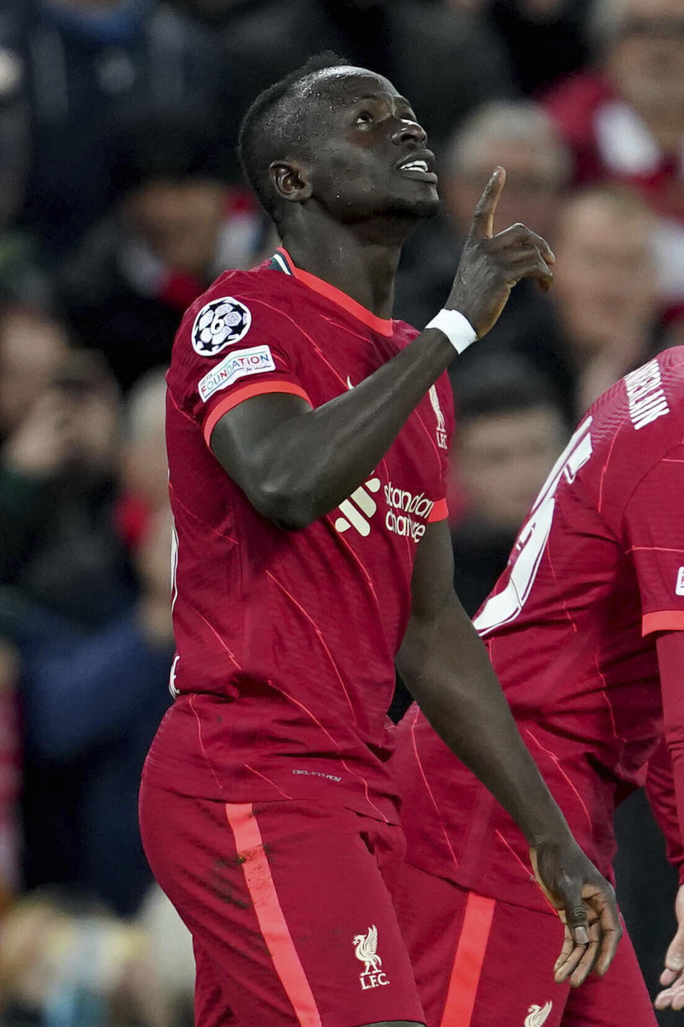 Liverpool's Sadio Mane celebrates scoring his side's second goal during the Champions League group B soccer match between Liverpool and Atletico Madrid in Liverpool, England, Wednesday, Nov. 3, 2021.(AP Photo/Jon Super)