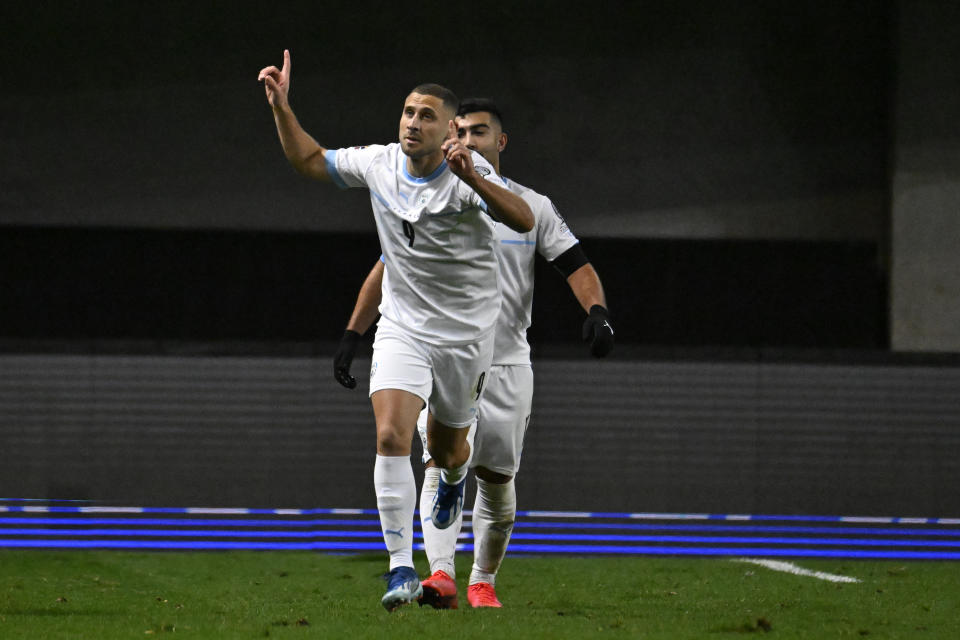 Israel's Shon Weissman celebrates after scoring his sides first goal during the Euro 2024 group I qualifying soccer match between Israel and Switzerland at the Pancho Arena in Felcsut, Hungary, Wednesday, Nov. 15, 2023. (AP Photo/Denes Erdos)