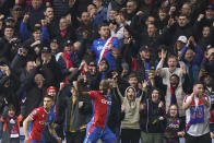 Crystal Palace's Jean-Philippe Mateta celebrates scoring his side's first goal of the game , during the English Premier League soccer match between Crystal Palace and Luton Town, at Selhurst Park, in London, Saturday March 9, 2024. (Bradley Collyer/PA via AP)