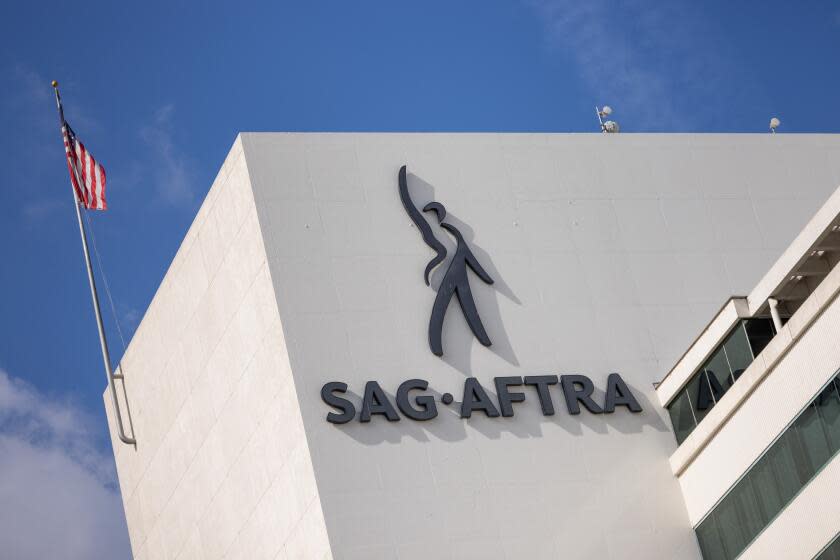 The SAG-AFTRA building with the SAG-AFTRA logo printed on the side