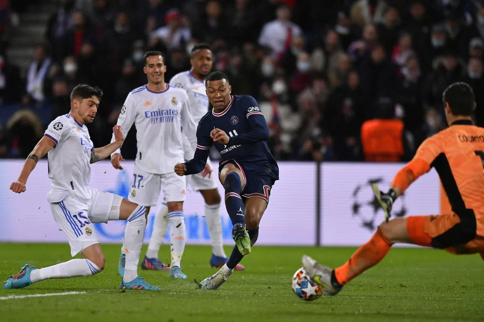 PARIS, FRANCE - FEBRUARY 15: Kylian Mbappe of Paris Saint-Germain scores during the UEFA Champions League Round Of Sixteen Leg One match between Paris Saint-Germain and Real Madrid at Parc des Princes on February 15, 2022 in Paris, France. (Photo by Aurelien Meunier - PSG/PSG via Getty Images)