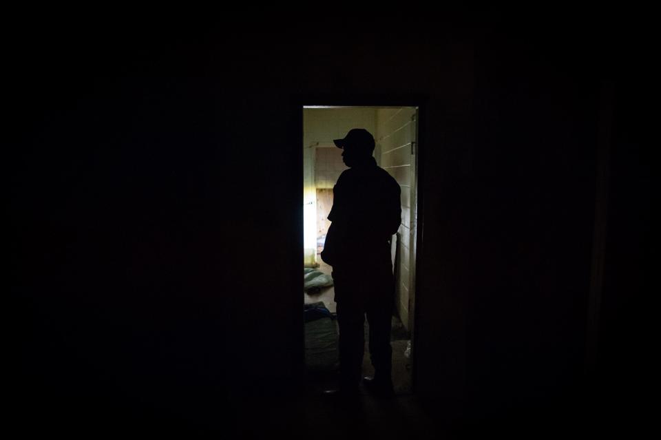Tom Roby, the current Noxubee County sheriff, looking through the old county jail in February.