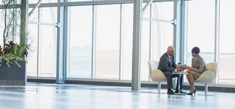 A financial advisor sitting with a client.