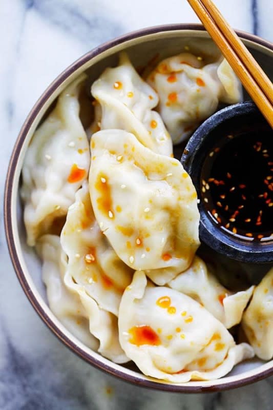<p>Rasa Malaysia</p><p>Juicy dumplings filled with pork, shrimp and napa cabbage. The easiest homemade dumplings recipe ever!</p><p><strong>Get the recipe: <a href="https://rasamalaysia.com/pork-shrimp-napa-cabbage-dumplings/" rel="nofollow noopener" target="_blank" data-ylk="slk:Pork Shrimp Napa Cabbage Dumplings;elm:context_link;itc:0;sec:content-canvas" class="link "><em>Pork Shrimp Napa Cabbage Dumplings</em></a></strong></p>