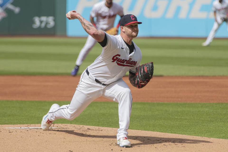 Cleveland Guardians starting pitcher Ben Lively delivers against the Washington Nationals during the first inning of a baseball game in Cleveland, Saturday, June 1, 2024. (AP Photo/Phil Long)