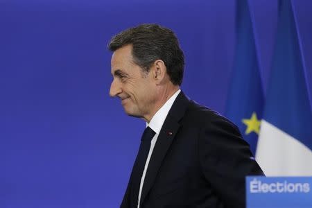 Nicolas Sarkozy, conservative UMP political party leader and former French president, attends a news conference after the close of polls in France's second round Departmental elections of local councillors at their party's headquarters in Paris March 29, 2015. REUTERS/Christian Hartmann