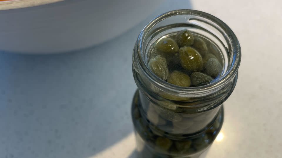 Popular ways to extract capers, according to Reddit: Use an old-fashioned potato peeler, chef’s tweezers, a tiny melon baller or a wide-mouth boba straw. - CNN