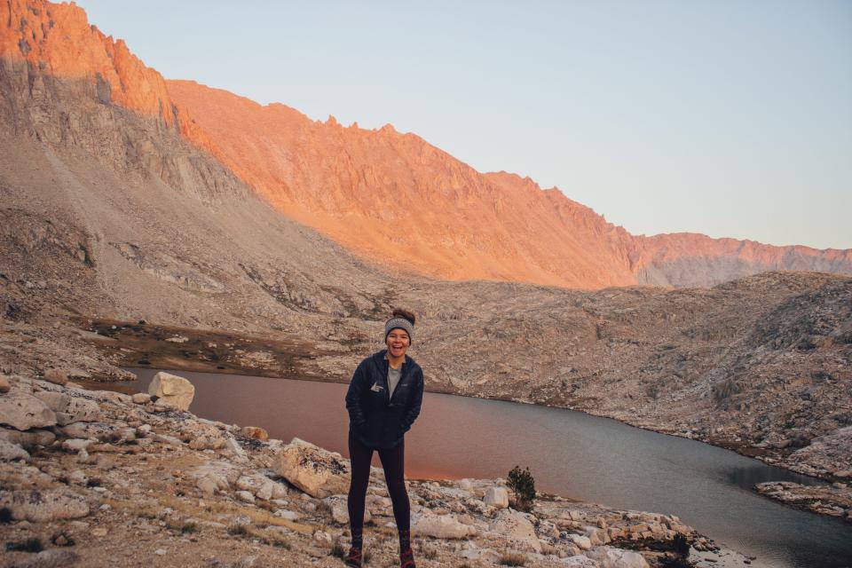 nicole jordan standing infront of desert mountains