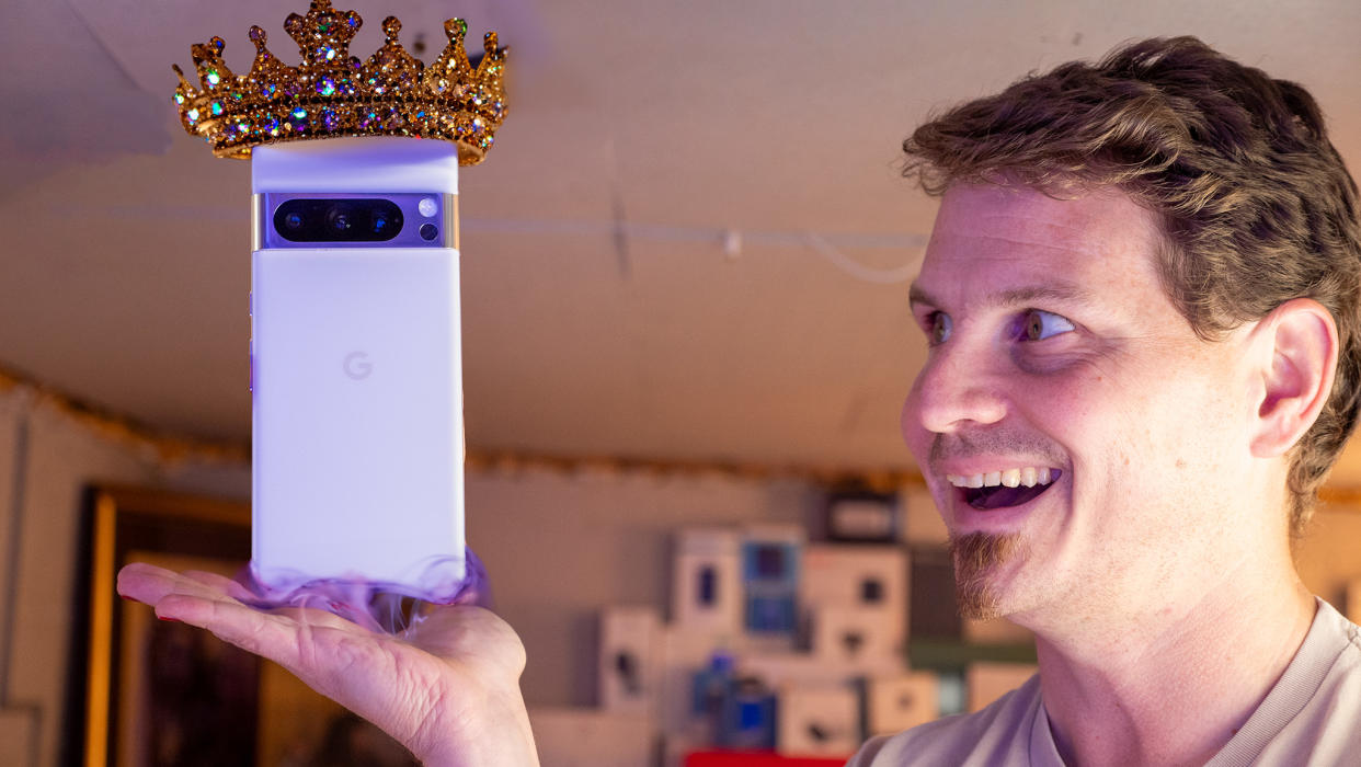  The Google Pixel 8 Pro wearing a crown, floating above my hand. 