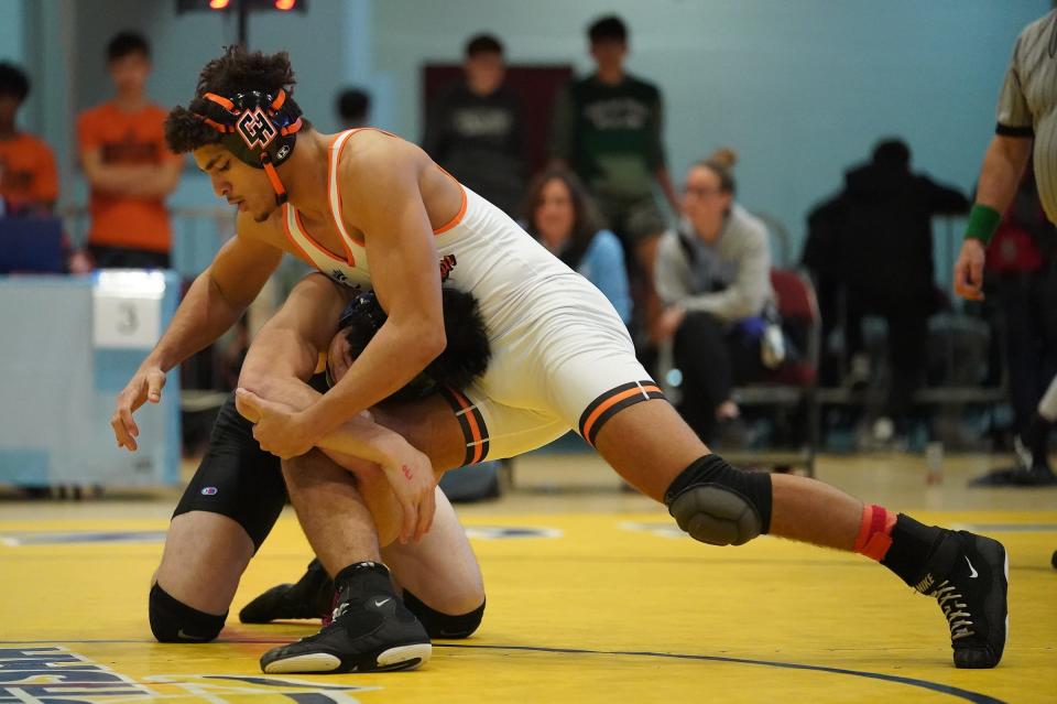 Croton-Harmon's Fredrick Smithwick wrestles Edgemont's Kenny Saito in the 170-pound championship match at the Section 1, Division II wrestling championships at Westchester County Center on Saturday, Feb. 10, 2024.