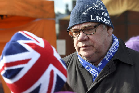 Finnish Foreign Minister Timo Soini is seen after an attempted attack at the Korson Maalaismarkkinat country fair in Vantaa, Finland March 24, 2019. Lehtikuva/Heikki Saukkomaa via REUTERS ATTENTION EDITORS - THIS IMAGE WAS PROVIDED BY A THIRD PARTY. NO THIRD PARTY SALES. NOT FOR USE BY REUTERS THIRD PARTY DISTRIBUTORS. FINLAND OUT. NO COMMERCIAL OR EDITORIAL SALES IN FINLAND.