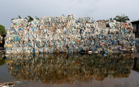 Plastic waste piled outside an illegal recycling factory in Jenjarom, Kuala Langat, Malaysia October 14, 2018.  - Credit: Lai Seng Sin/REUTERS