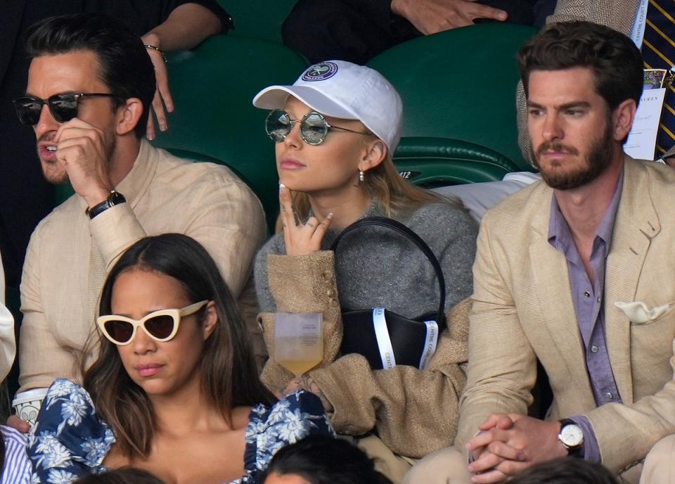 Jonathan Bailey,  Ariana Grande and Andrew Garfield (AP)