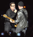 U2's <a href="http://news.yahoo.com/photos/performers-the-edge-bono-1316460337-slideshow/" data-ylk="slk:The Edge and Bono;elm:context_link;itc:0;sec:content-canvas;outcm:mb_qualified_link;_E:mb_qualified_link;ct:story;" class="link  yahoo-link">The Edge and Bono</a> will perform live at the Decade of Difference Concert. The Irish rockers have won 22 Grammy Awards with their band. (AP Photo/Gail Burton)