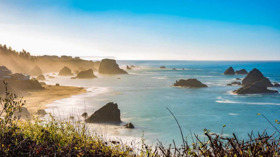 Morning mist rising from Harris Beach, near Brookings, Oregon. The rock formations add to the views looking out at the Pacific Ocean