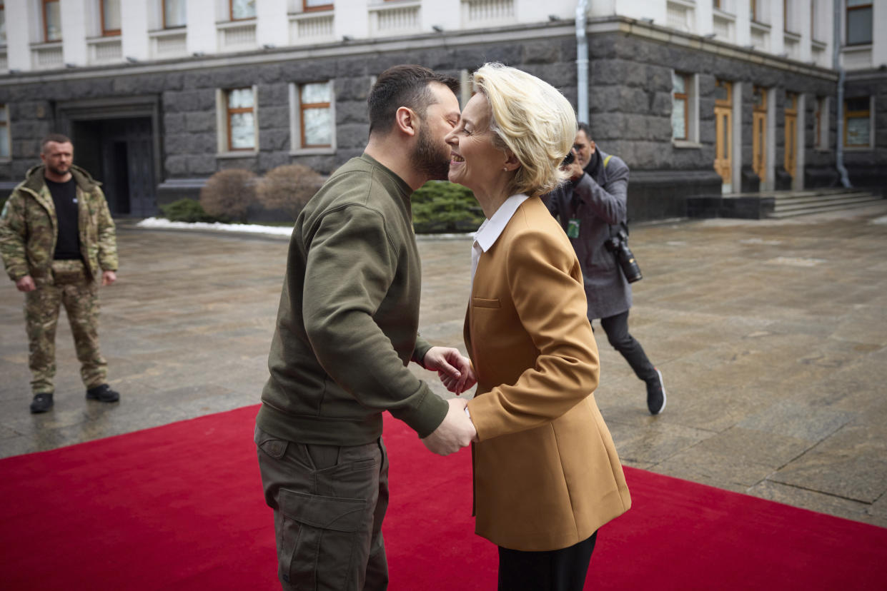 Ukrainian President Volodymyr Zelenskyy, left, and European Commission President Ursula von der Leyen greet each other during the EU-Ukraine summit in Kyiv, Ukraine, Thursday, Feb. 2, 2023. ((Ukrainian Presidential Press Office via AP)