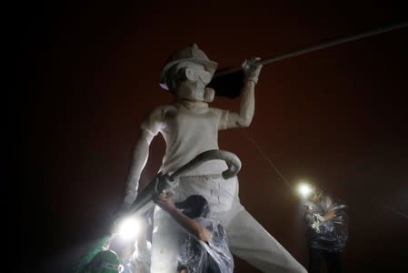 Anti-government protesters set up the "Statue of Lady Liberty Hong Kong" on the iconic Lion Rock in Hong Kong