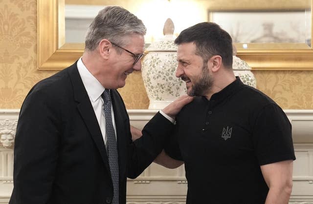 Sir Keir Starmer sharing a joke with Volodymyr Zelensky