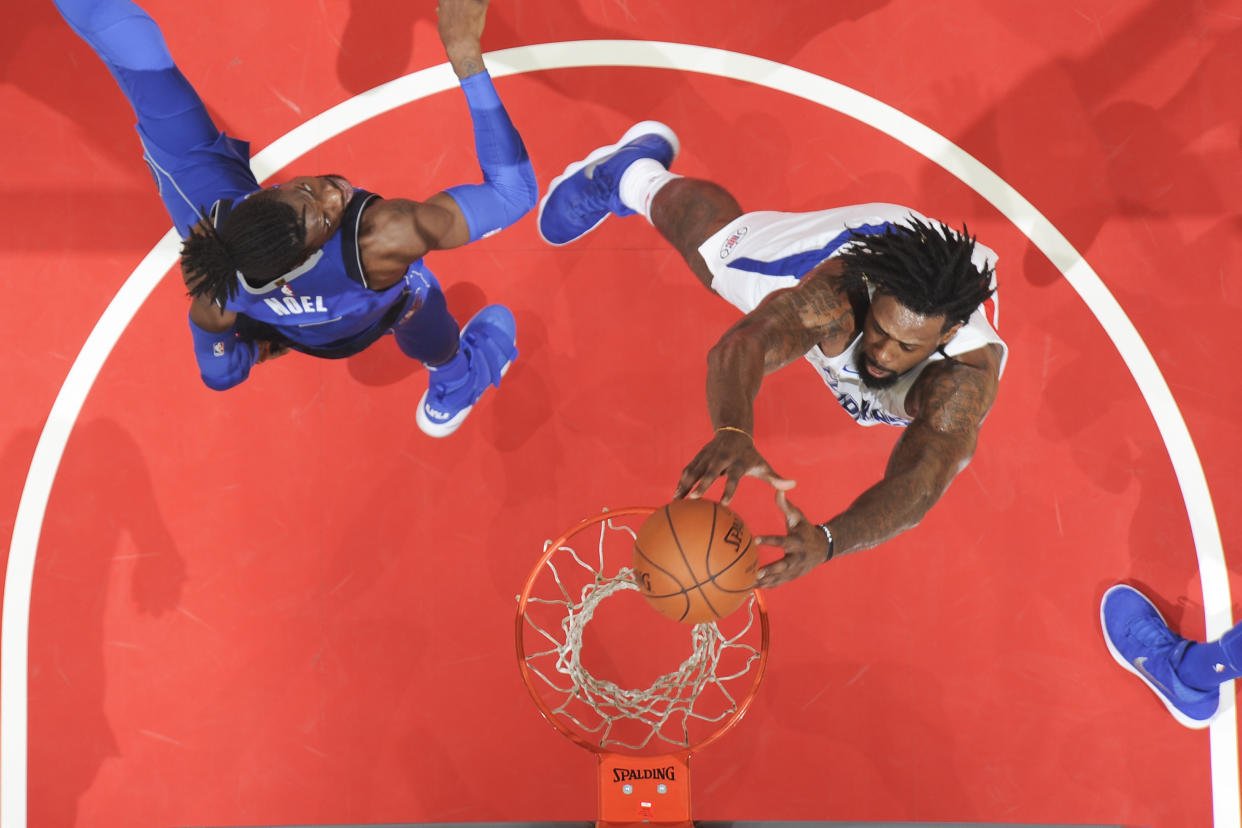 The next time DeAndre Jordan goes above the rim to throw it down, he’ll be wearing a Dallas Mavericks uniform. (Getty)