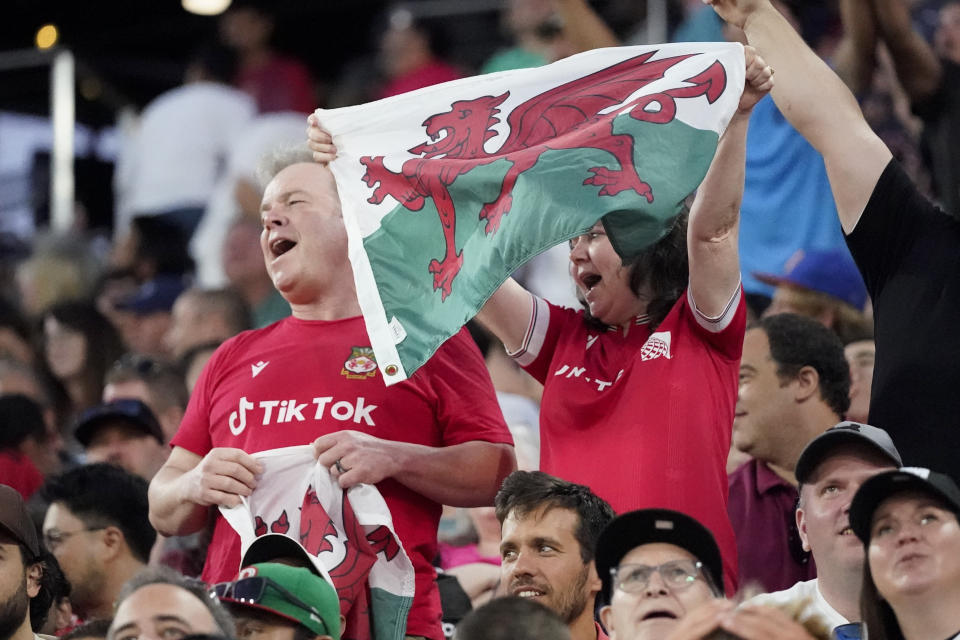 Wrexham fans cheer during the first half of a club friendly soccer match against Manchester United, Tuesday, July 25, 2023, in San Diego. (AP Photo/Gregory Bull)