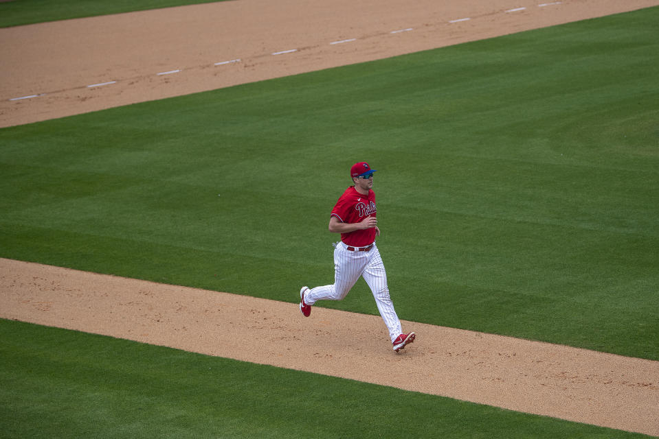 Philadelphia Phillies first baseman Rhys Hoskins runs the bases during spring training baseball practice in Clearwater, Fla., Monday, Feb. 22, 2021. (Jose F. Moreno/The Philadelphia Inquirer via AP)