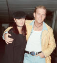 Matt Goss from the pop group Bros, and his girlfriend, model Melanie Sykes arrive at London Heathrow Airport from Los Angeles. Picture taken 31st December 1992. (Photo by Victor Crawshaw/Mirrorpix/Getty Images)