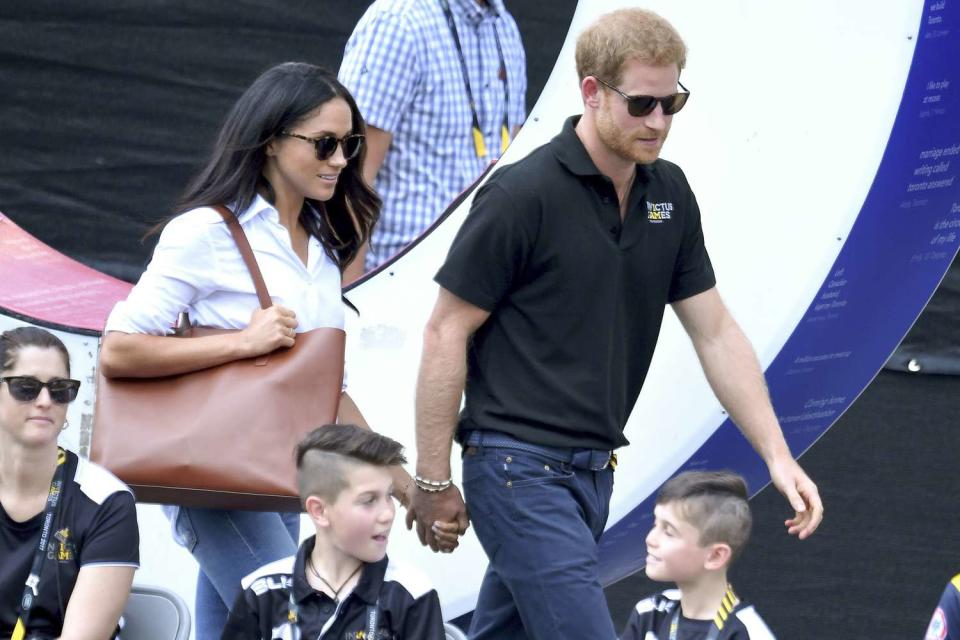 <p>Meghan Markle and Prince Harry made their debut as a couple in 2017, holding hands at the Invictus Games in Toronto, Canada.</p>