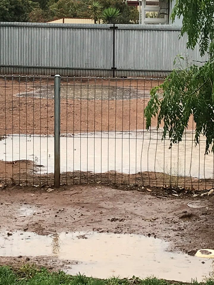 Flooded car park in Hillston, NSW, as central parts of the drought-stricken receive rain downpour on Sunday.