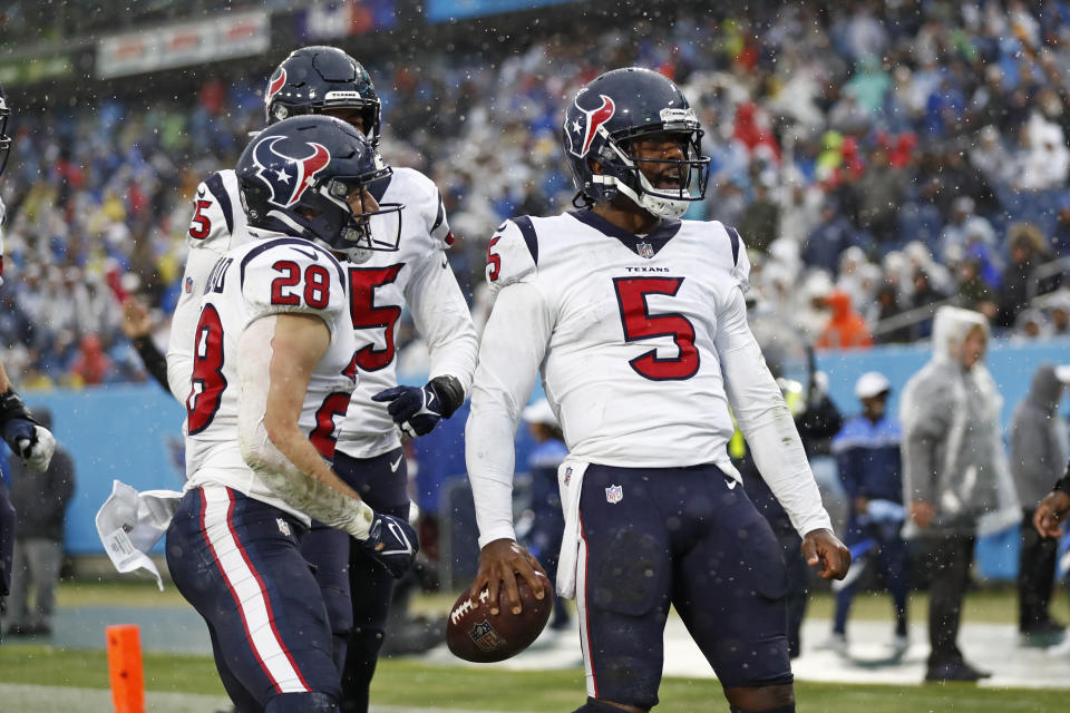 Houston Texans quarterback Tyrod Taylor (5) celebrates after scoring a touchdown against the Tennessee Titans in the first half of an NFL football game Sunday, Nov. 21, 2021, in Nashville, Tenn. (AP Photo/Wade Payne)