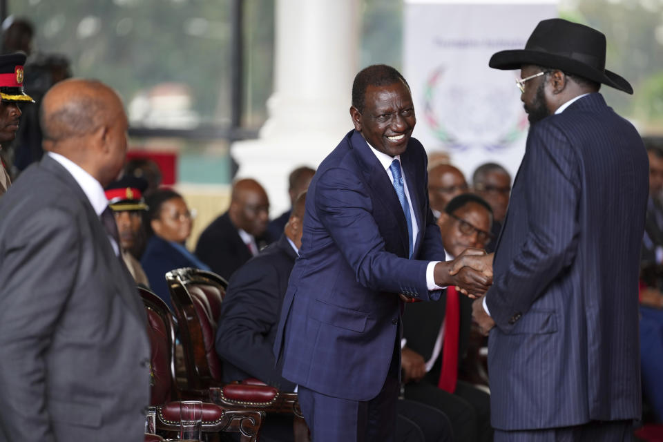 Kenya's President William Ruto, centre, shakes hands with South Sudan's President Salva Kiir Mayardit after addressing the launch of high-level peace talks for South Sudan at State House in Nairobi, Kenya, on Thursday, May 9, 2024. High-level mediation talks on South Sudan were launched in Kenya with African presidents in attendance calling for an end to a conflict that has crippled the country's economy for years. (AP Photo/Brian Inganga)