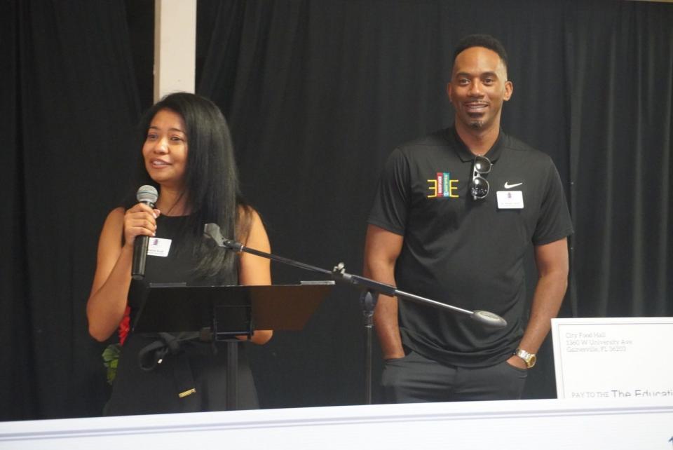 Education Equalizer Foundation co-founders, Carjie Scott, left, and Kerwin Scott, right, speak during the foundation's Million Dollar Scholar Brunch held Saturday at Upper Room Ministries of Greater Gainesville.
(Credit: Photo provided by Voleer Thomas)