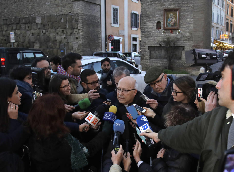 Bishop Fernando Ramos, Secretary General Episcopal Conference of Chile, receives media attention near the Vatican, in Rome Monday, Jan. 14, 2019. A delegation of Chilean bishops has met with Pope Francis a year after he threw his papacy into turmoil by defending a Chilean bishop accused of covering for a notorious sexual predator. (AP Photo/Alessandra Tarantino)