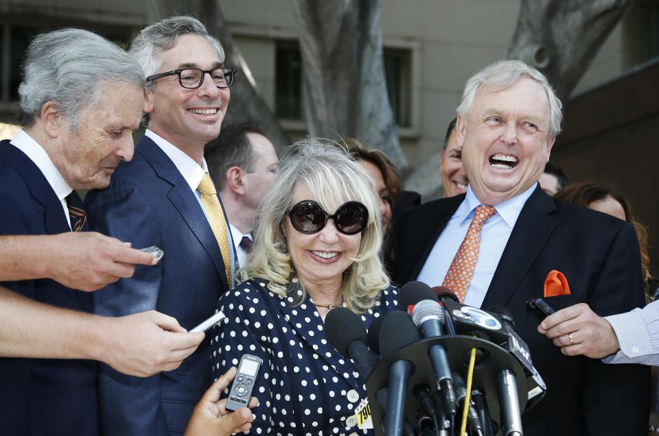 Shelly Sterling, 79, (2nd R) speaks at a news conference with her lawyer Pierce O'Donnell (R) and Steve Ballmer's lawyer Adam Streisand (2nd L) in Los Angeles, California July 28, 2014. The record $2 billion sale of pro basketball's Los Angeles Clippers to former Microsoft Corp chief executive Steve Ballmer can proceed over the objections of co-owner Donald Sterling, a judge tentatively ruled on Monday. Los Angeles Superior Court Judge Michael Levanas said the deal, brokered by Sterling's estranged wife, Shelly Sterling, was permissible and could be consummated even if Sterling, who has been banned for life from the NBA for racist remarks, chose to appeal. REUTERS/Lucy Nicholson (UNITED STATES - Tags: CRIME LAW SPORT BASKETBALL TPX IMAGES OF THE DAY)