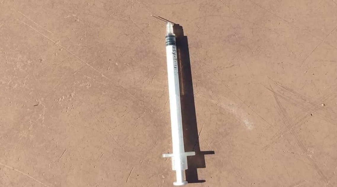 A San Diego mom proposed a ban on adults without children at playgrounds after her son was scratched by this hypodermic needle. (Photo: Change.org)